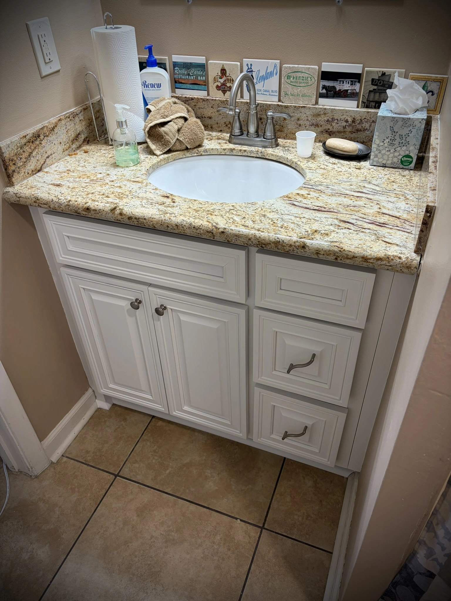 Bathroom cabinets fine finish painted with SW Greek Villa in Hide-A-Way Lake, MS - Paint Star