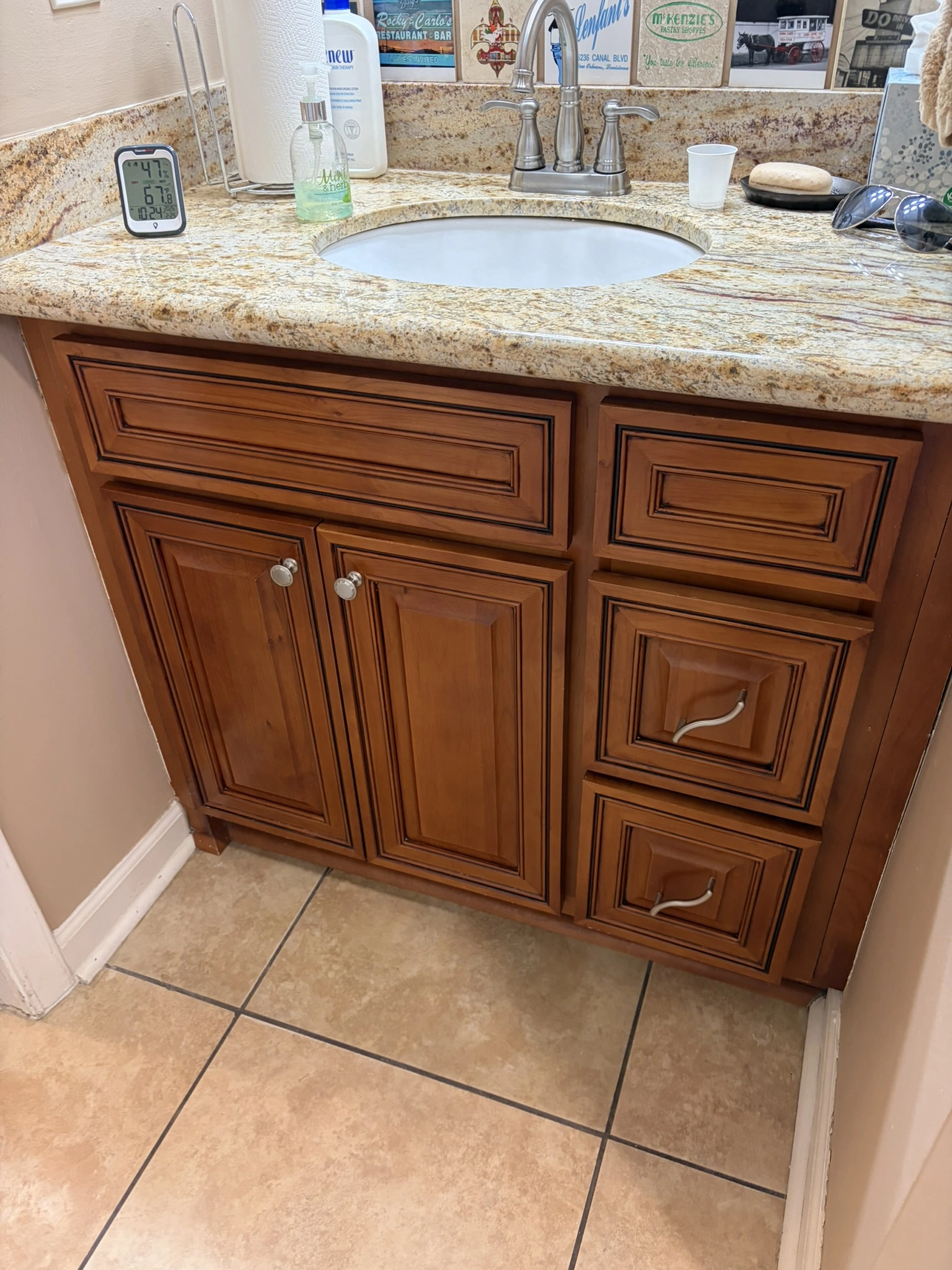 Bathroom cabinets before being painted with SW Greek Villa in Hide-A-Way Lake, MS - Paint Star
