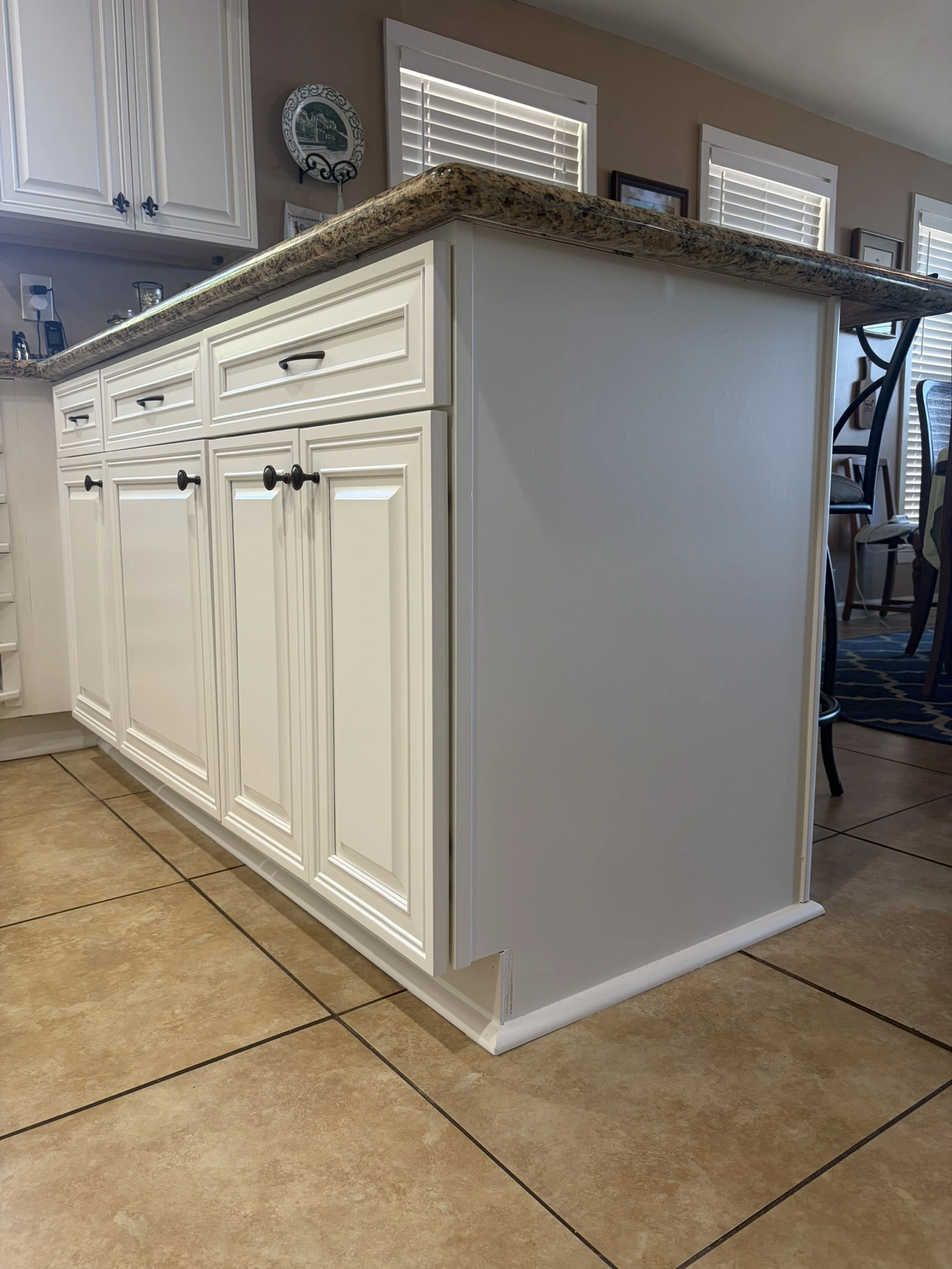 Kitchen cabinets before being painted with SW Greek Villa in Hide-A-Way Lake, MS - Paint Star