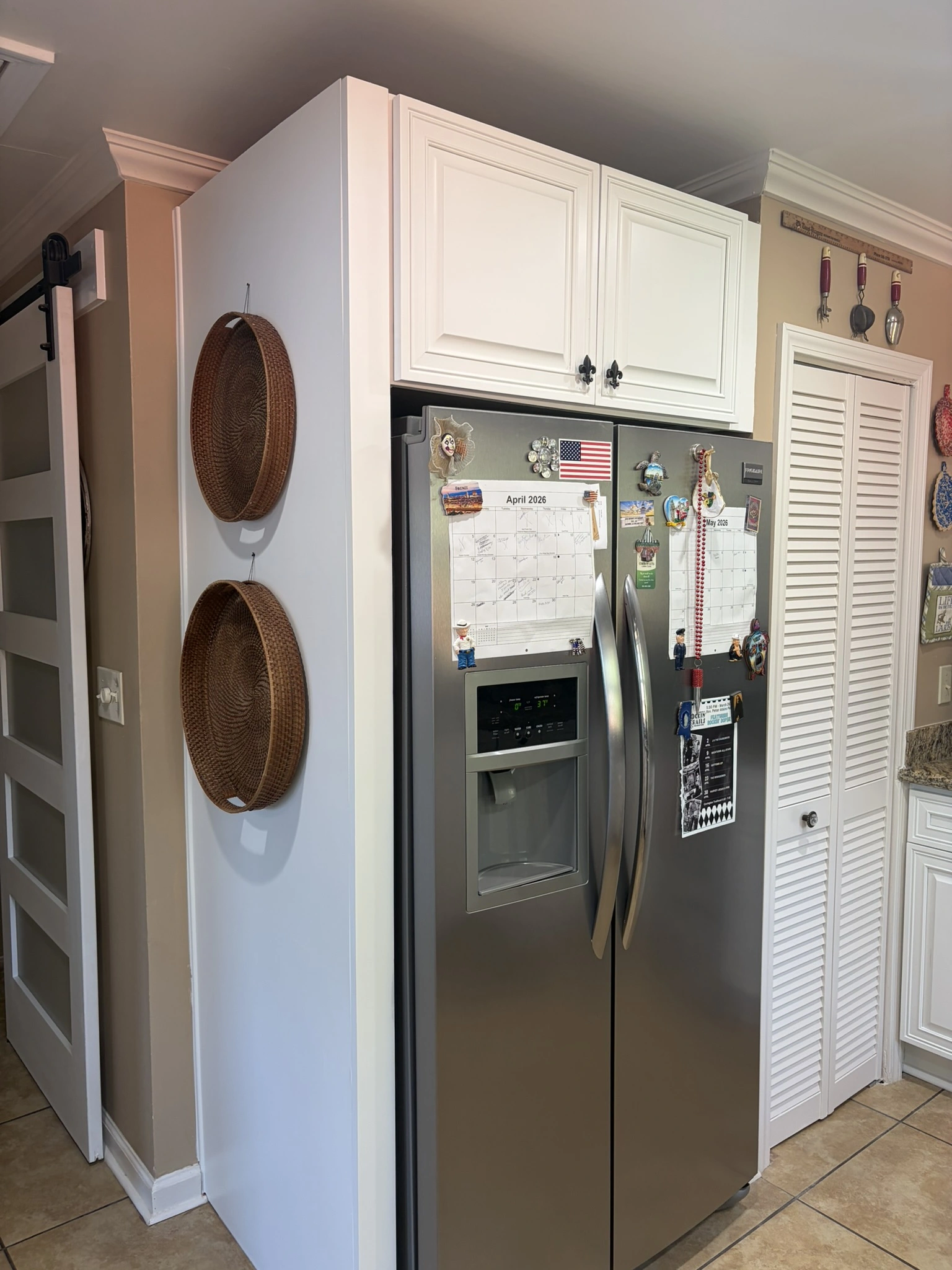 Kitchen cabinets before being painted with SW Greek Villa in Hide-A-Way Lake, MS - Paint Star
