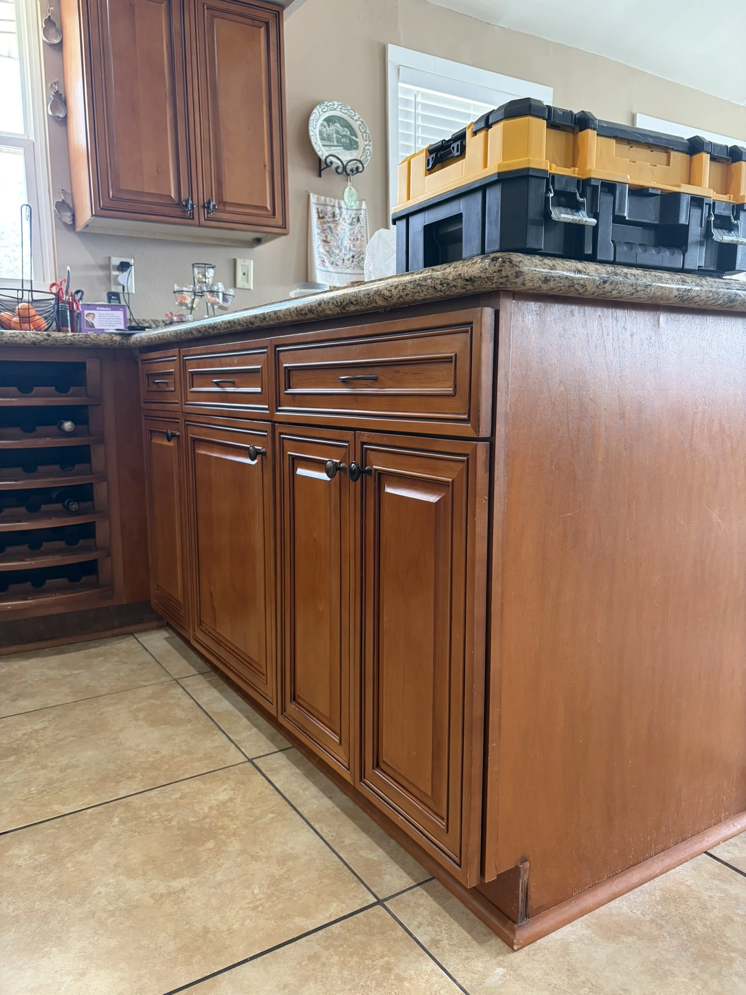 Kitchen cabinets before being painted with SW Greek Villa in Hide-A-Way Lake, MS - Paint Star